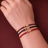 Tibetisches Glücksarmband mit kleinen Perlen